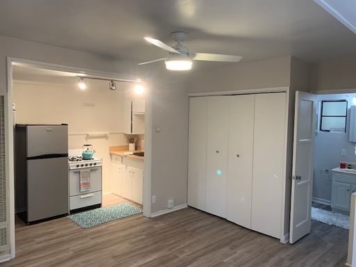 Studio Apt= Full Kitchen, a/c, Laundry on-site, Wood Plank Flooring, Lots of Storage, Parking