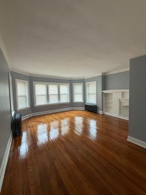 Introducing 8228 S Maryland, a three-bedroom, one-bath apartment in Chicago, IL. – photo 1