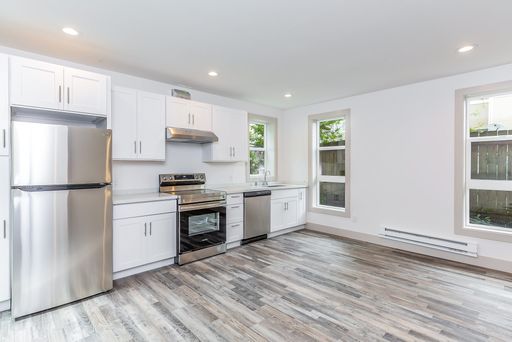 Updated 2-Story 2bed/1.5bath Apartment in Rainier Valley! – photo 1
