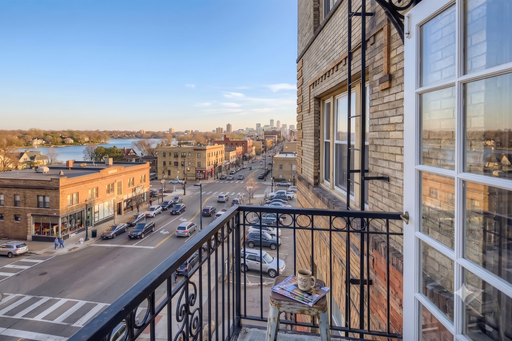 Bright 3rd-Floor 1BR with Balcony and Sweeping Treetop Views at East Isles Flats! – photo 1