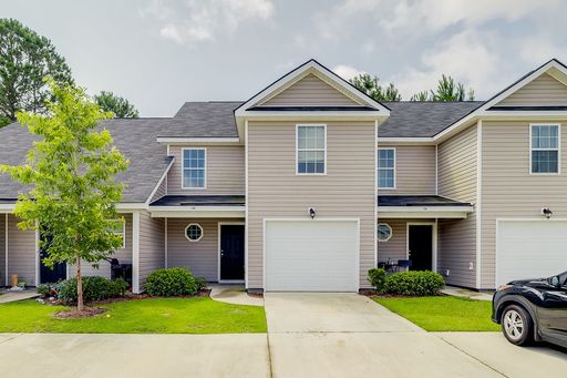 Charming 3BR Townhome with Convenient Main-Level Primary Suite – photo 1