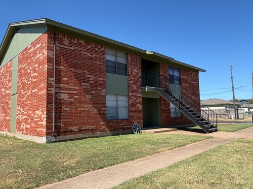 Your Next Home: Stylish 2 Bed, 1 Bath quadplex with Personality!