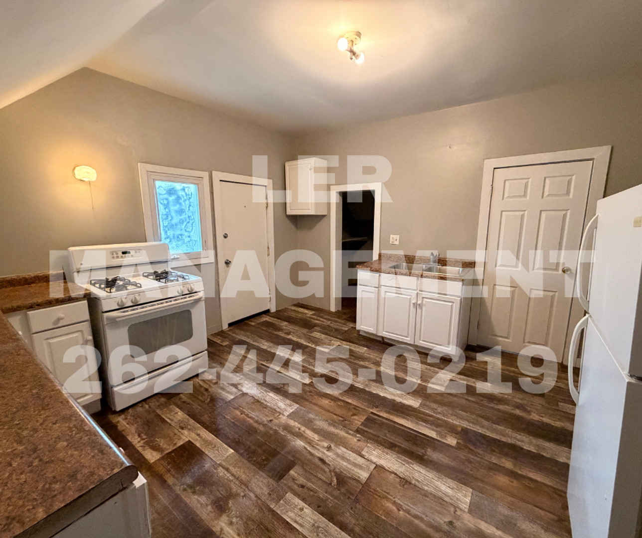 Racine Apartment: 1623 Maple Street