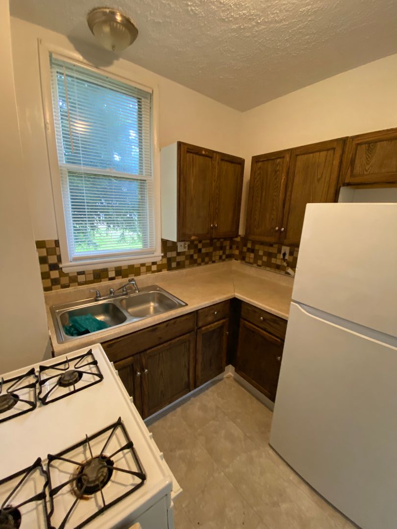 One Bedroom Duplex with off street parking and private enclosed porch