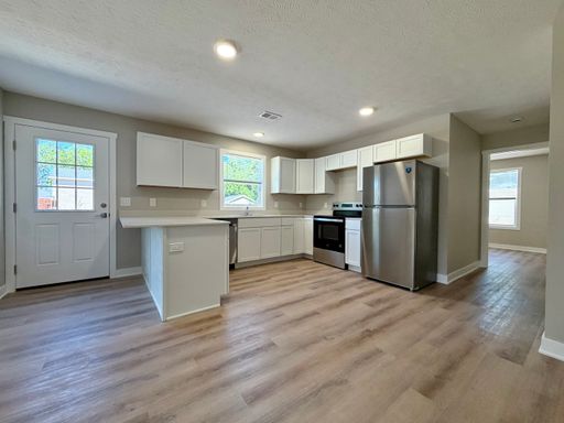Three Bedroom Duplex in Muskegon - New Construction! – photo 1