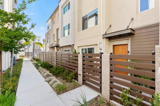 Modern Tri-Level Townhome in Gated Gardena Community with 2-Car Garag – photo 1