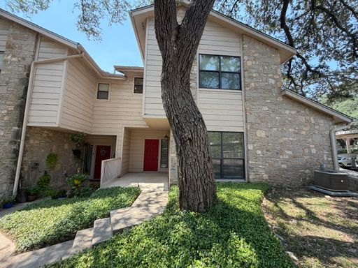 Charming Condo in Desirable Area ~ Fireplace ~ Great Location – photo 1