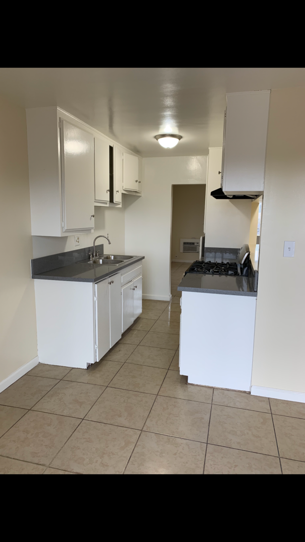Whittier Apartment: 10733 Orange Grove Avenue / 5567 Norwalk Blvd.