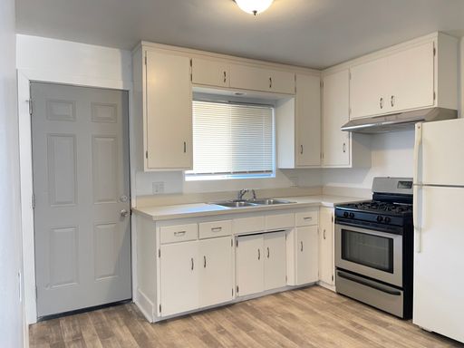 Beautiful Remodeled Two Bedroom Apartment home for lease with attached garage and large yard! $1695 – photo 1