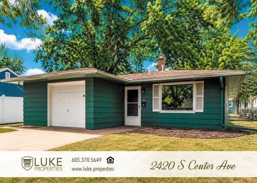 Charming three bedroom home with garage and spacious backyard – photo 1