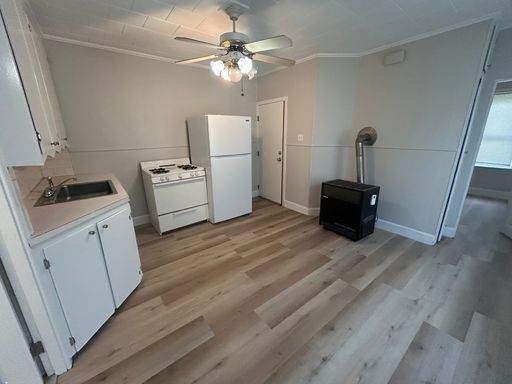 One bedroom first floor unit with fresh paint, flooring in a beautiful area.