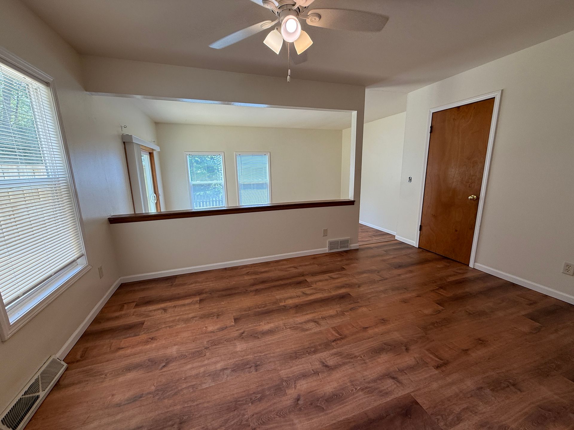 Call for rent special! New deck! 3 Bedroom, updated kitchen, updated flooring, garage, driveway, and fenced yard - 9 month lease available! 2 of 12