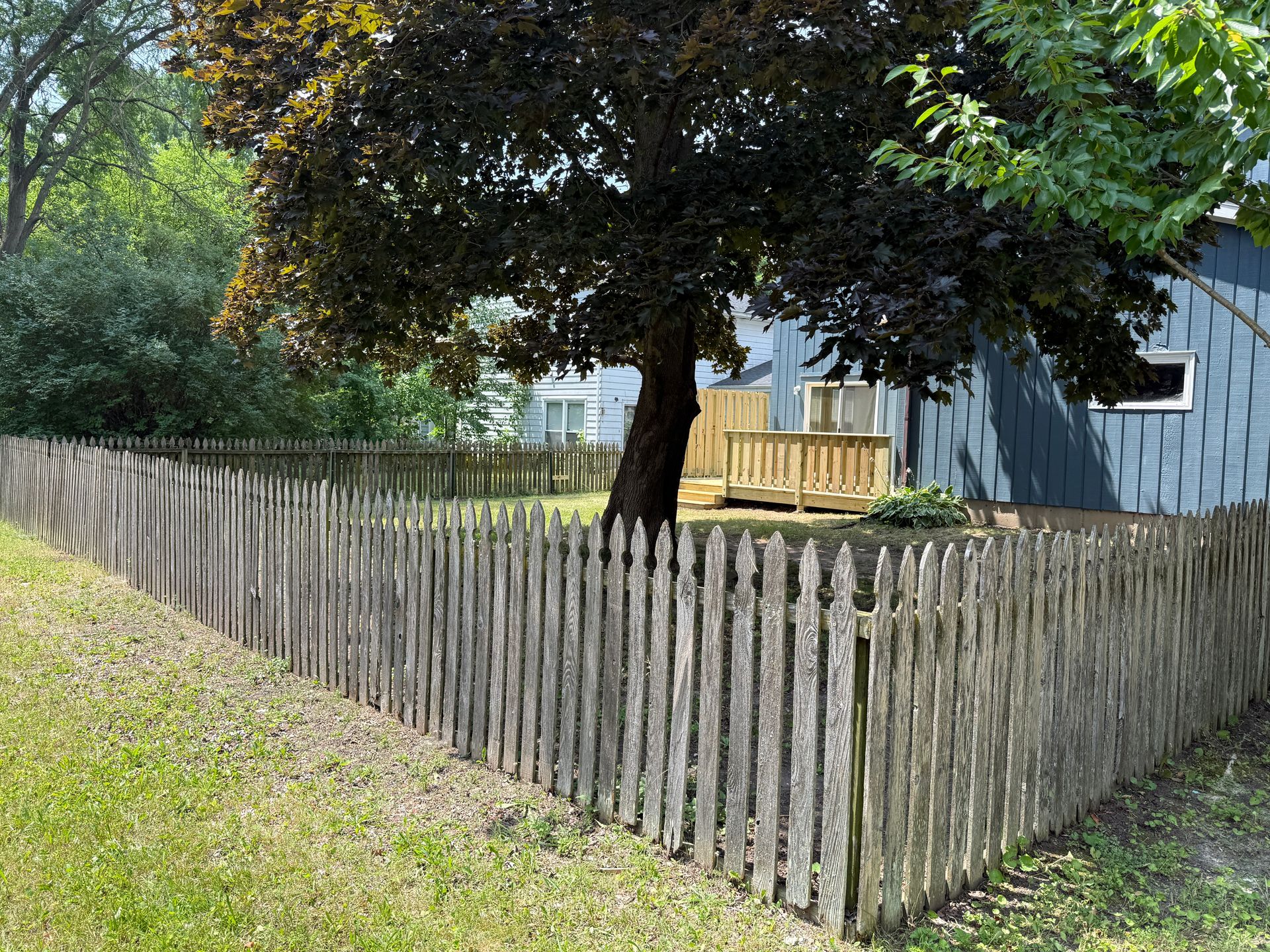 Call for rent special! New deck! 3 Bedroom, updated kitchen, updated flooring, garage, driveway, and fenced yard - 9 month lease available! 12 of 12