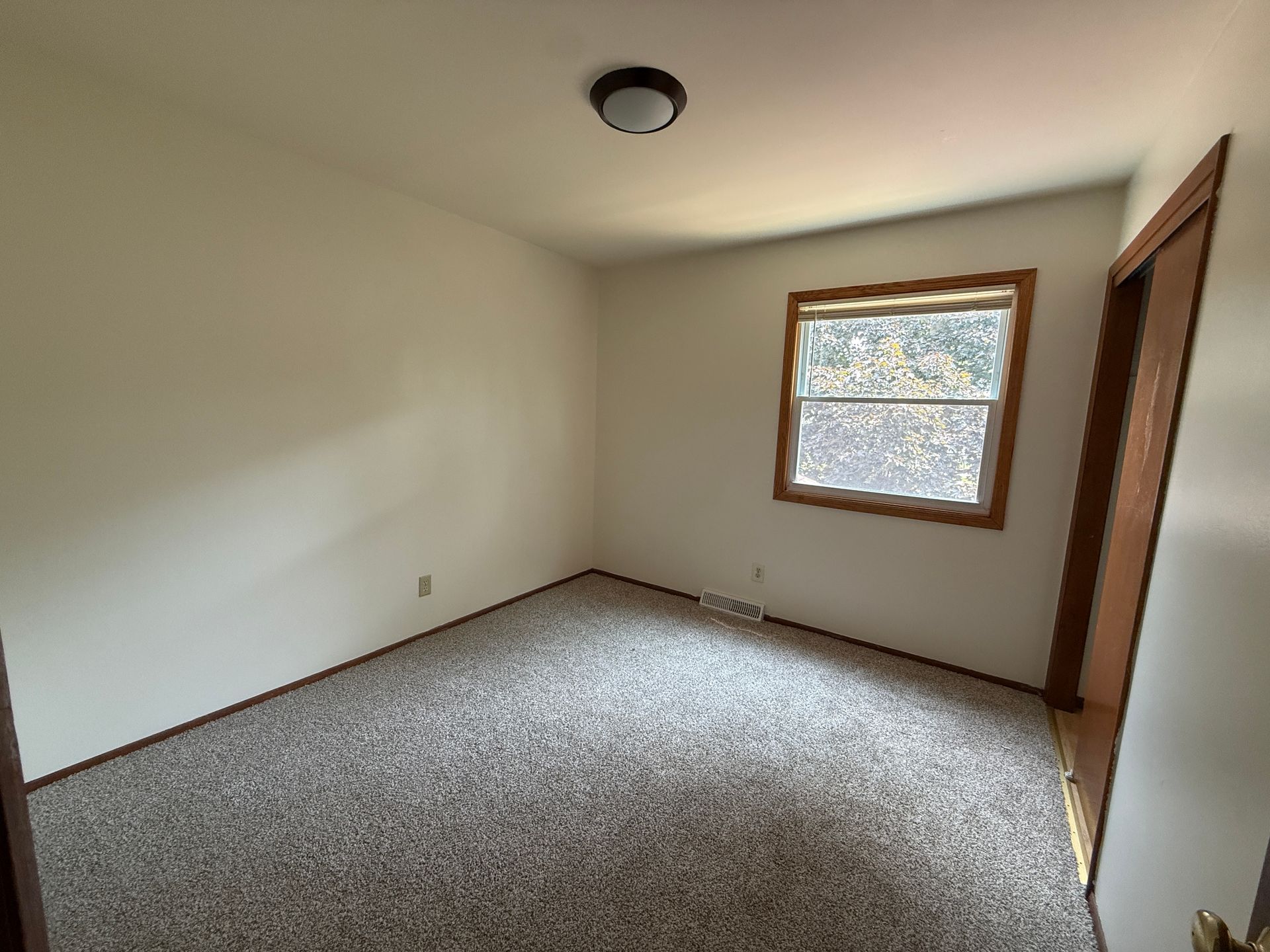 Call for rent special! New deck! 3 Bedroom, updated kitchen, updated flooring, garage, driveway, and fenced yard - 9 month lease available! 10 of 12