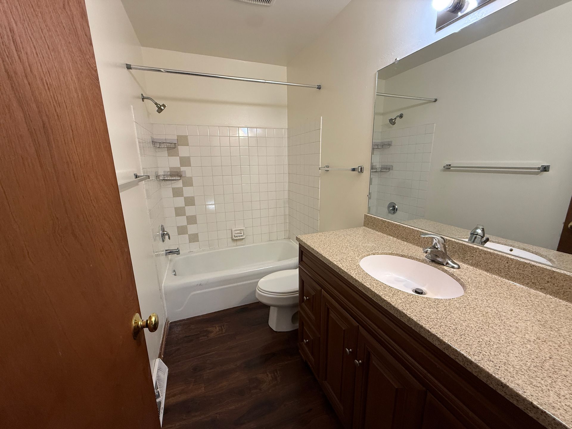 Call for rent special! New deck! 3 Bedroom, updated kitchen, updated flooring, garage, driveway, and fenced yard - 9 month lease available! 11 of 12