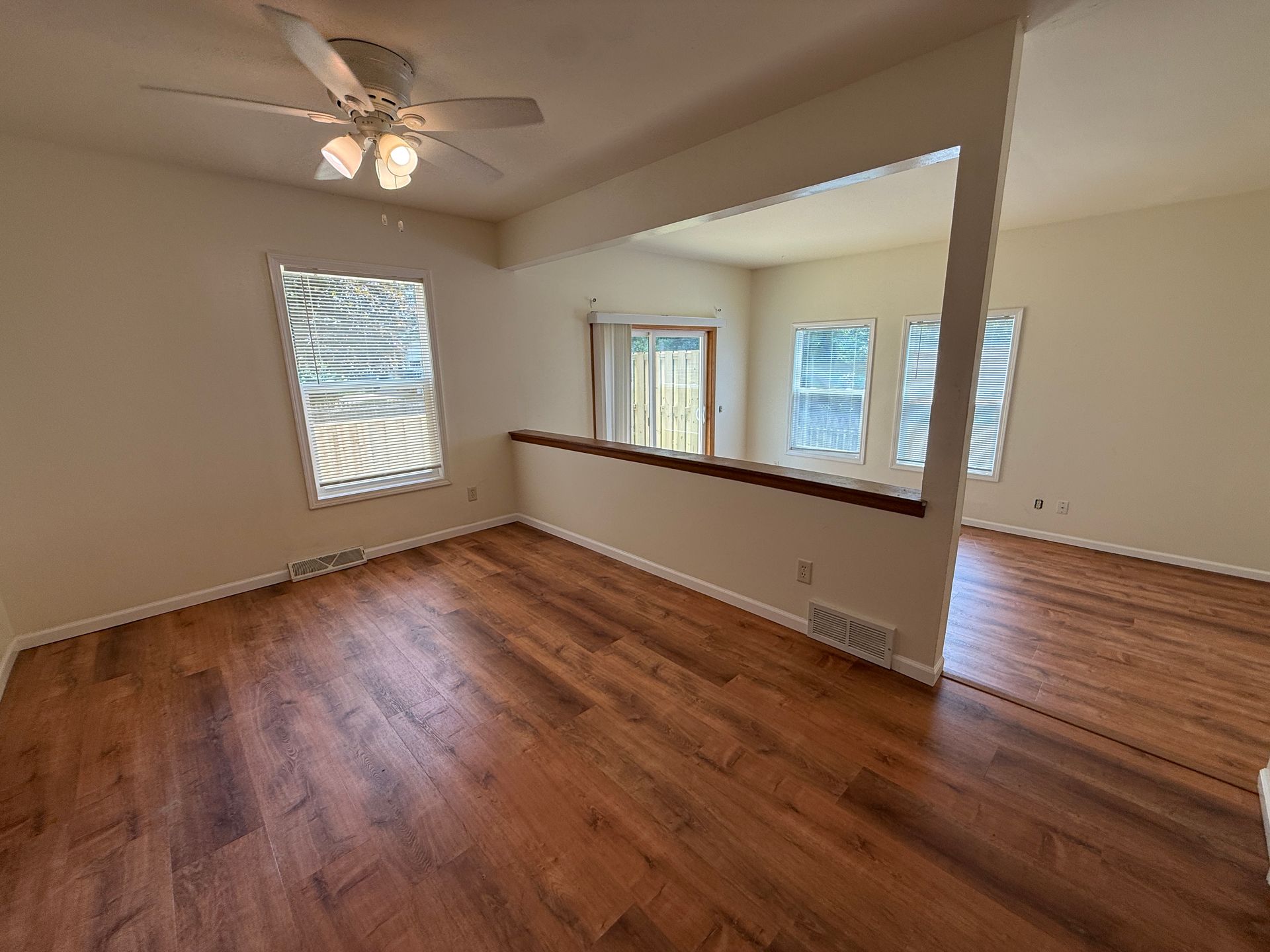 Call for rent special! New deck! 3 Bedroom, updated kitchen, updated flooring, garage, driveway, and fenced yard - 9 month lease available! 6 of 12