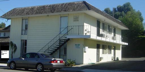 Ideal first floor unit! 2 bedrooms, 1 bathroom! Directly across from beautiful Lake Alhambra. Private covered parking. Community laundry room. SECTION 8 FRIENDLY! – photo 1