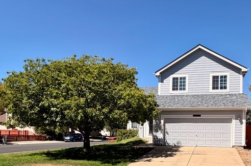 Spacious 4 Bedroom Home with Finished Basement, Vaulted Ceilings & Huge Fenced Yard