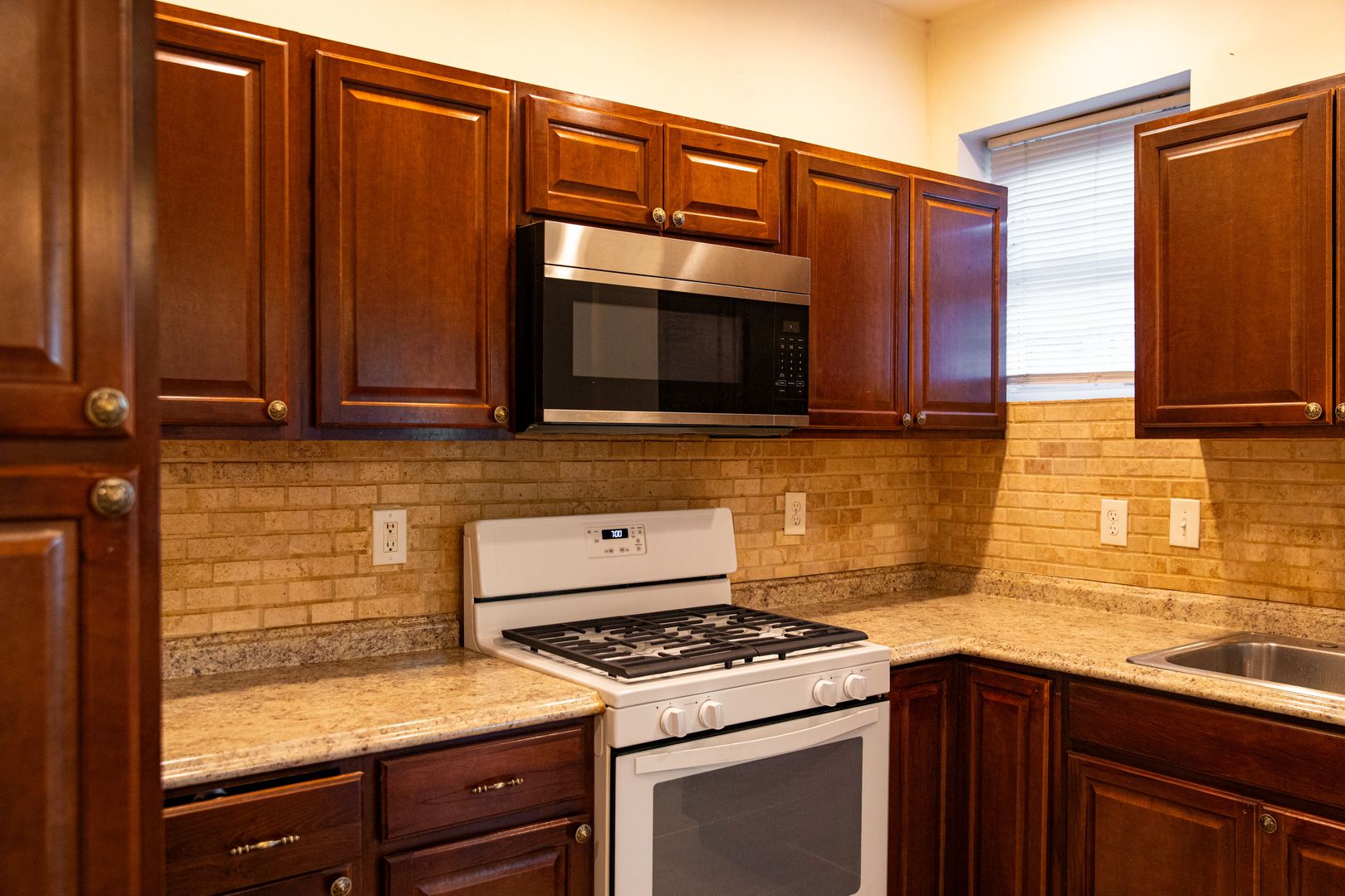 Updated kitchen with stainless appliances