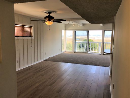 STUNNING 3 + 2, expansive Wetlands and Marina views, quiet neighborhood & walk to the beach.