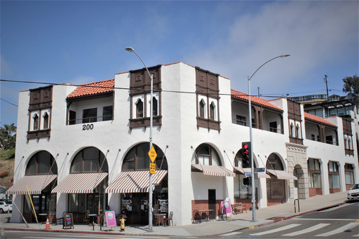Windowed street front Commercial space in a HISTORICAL Playa Del Rey anchor building.