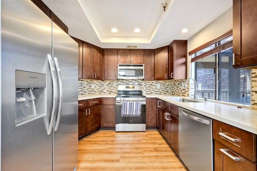 Move In Special Available Now! Mission Valley Beautiful Woodspring Top Floor Condo – photo 1