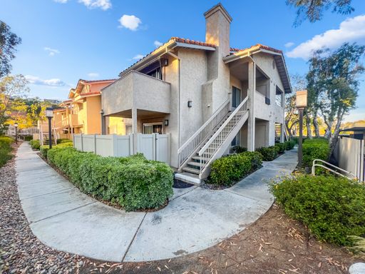 Rancho San Diego- Beautiful Mirasol Complex- 2 bed / 2 bath Upstairs Condo w A/C, Laundry + Parking- Summer Special! $750 OFF YOUR FIRST MONTH – photo 1
