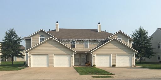 Inviting Harrisonville Townhome with Attached Garage & Cozy Fireplace – photo 1
