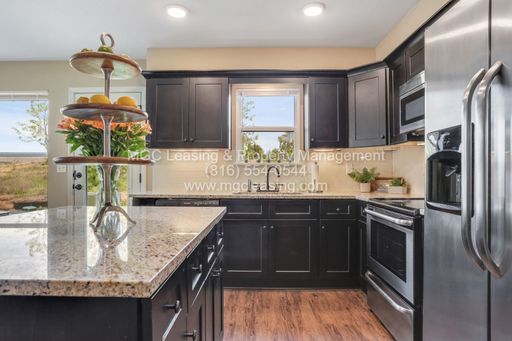 2 Bedroom at Beautiful Serrano Townhomes in Kansas City - North of the River! – photo 1