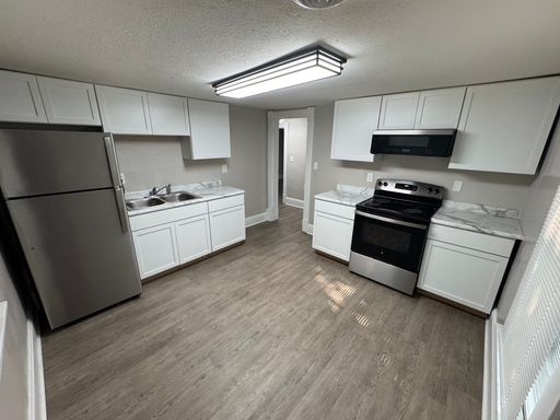 One Bedroom Upstairs Apartment – photo 1