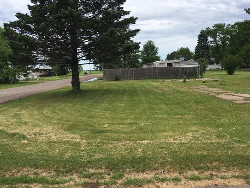 Vacant lot ready for your Double or Single Section Home