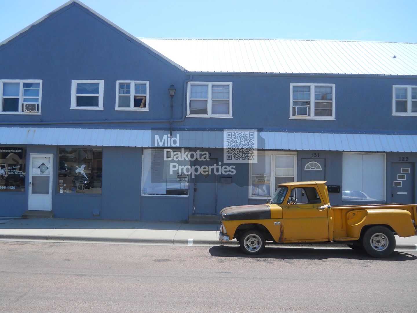 Mitchell Apartment: 125, 127, 127 1/2,129, 131, 133, 135 E 2nd