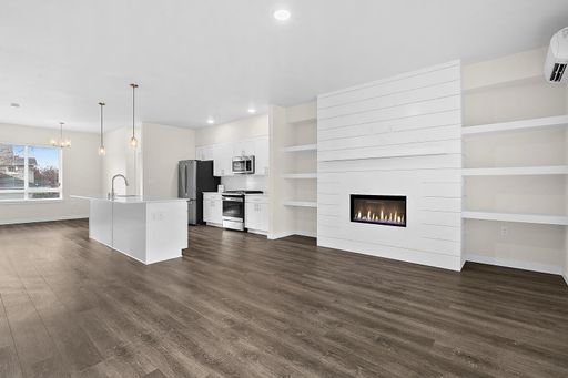 Contemporary 4 Bedroom, 3 Bath Townhome with 2-Car Garage! – photo 1