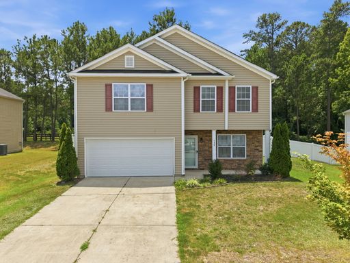 Enjoy Outdoor Living in the Fully Fenced-In Backyard
