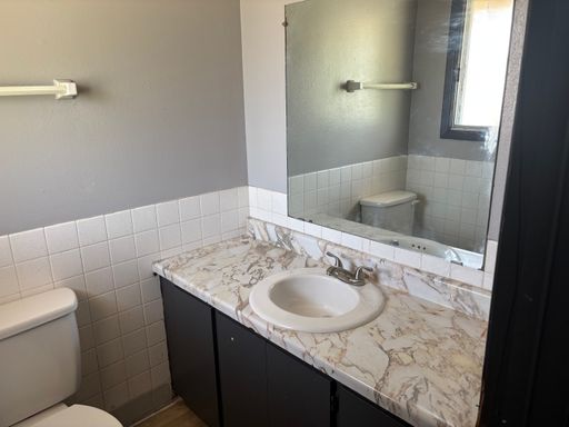 Spacious 2BR/1.5BA Home with Onsite Laundry & Modern Appliances – Only $1,105 Total Monthly Price! – photo 1