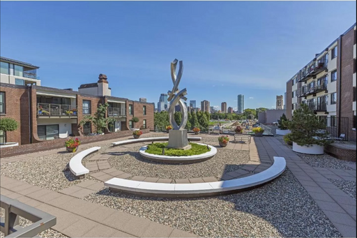 Lowry Hill 1BR w/ Skyline Views + Heated Garage | 745 SF – photo 1