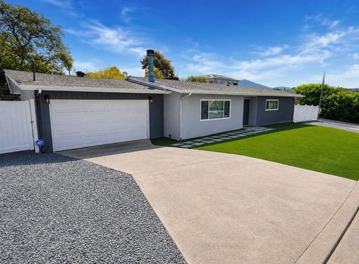 Updated 3 Bedroom Home with Modern Finishes, Private Yard & 2 Car Garage – photo 1