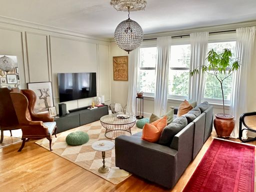 Elegant 2BR - Top Floor w/ Screened in Porch + Formal Dining Room – photo 1