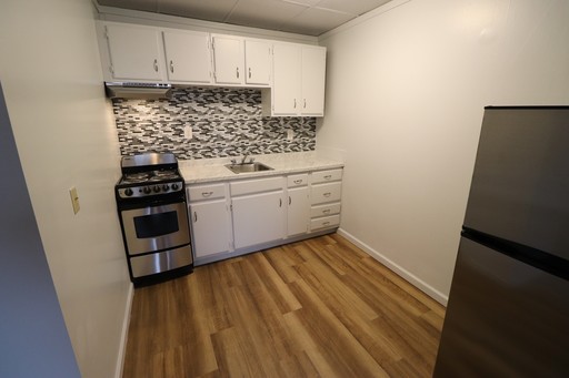 Make yourself at home in this charming historical downtown apartment! – photo 1