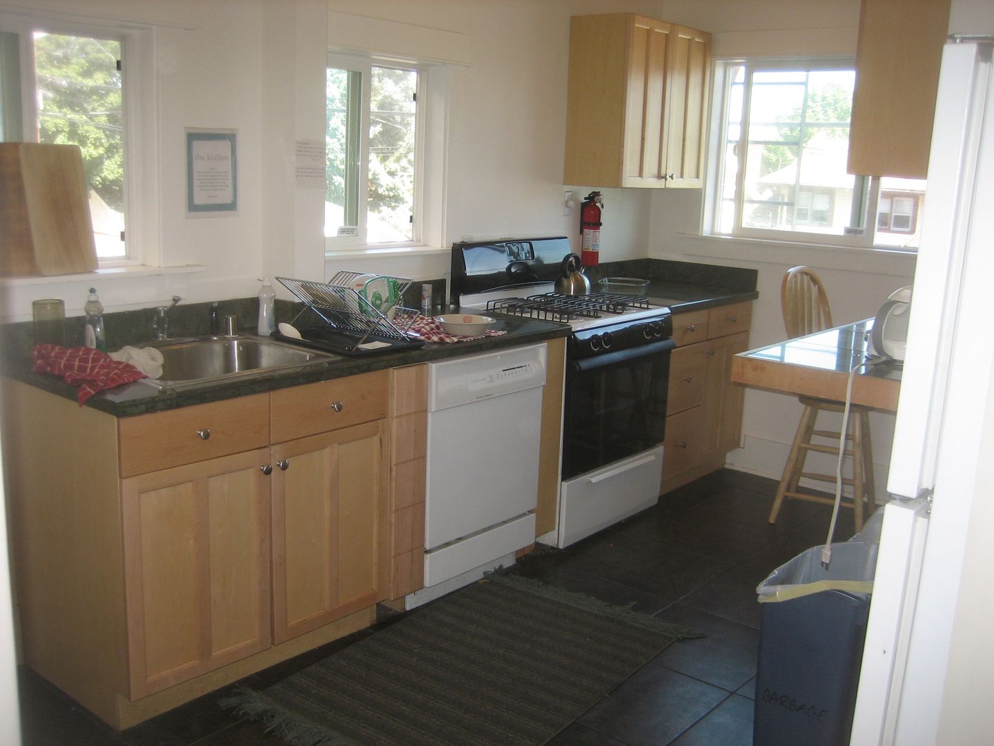 -- 2 Blocks to the University of Washington!- Nice Room in Shared House, Private Leases, Locking Doors, Weekly Cleaning Service, New Paint/ Carpets -- 6 of 12