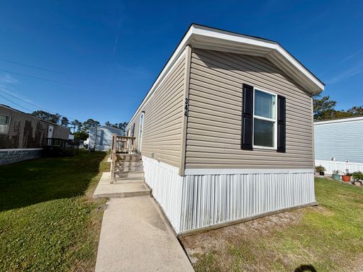 Cozy Modern Living at Holiday City – $1,398 | 2 Bed / 2 Bath – photo 1