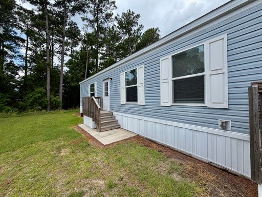 Energy Efficient & Turnkey Living at Holiday City – $1,398/Month | 3 Bed / 2 Bath – photo 1