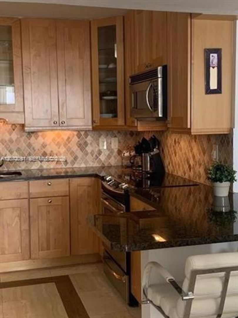 Surfside Condo: 9341 Collins Ave cu-1203