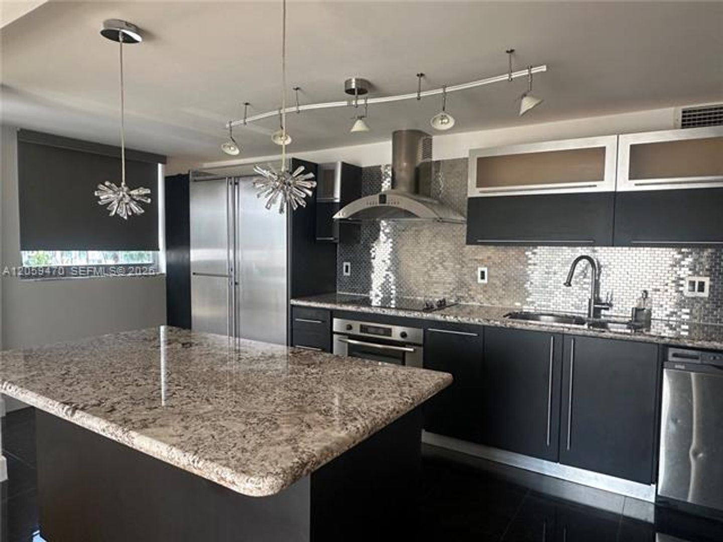 Surfside Condo: 9273 Collins Ave cu-212