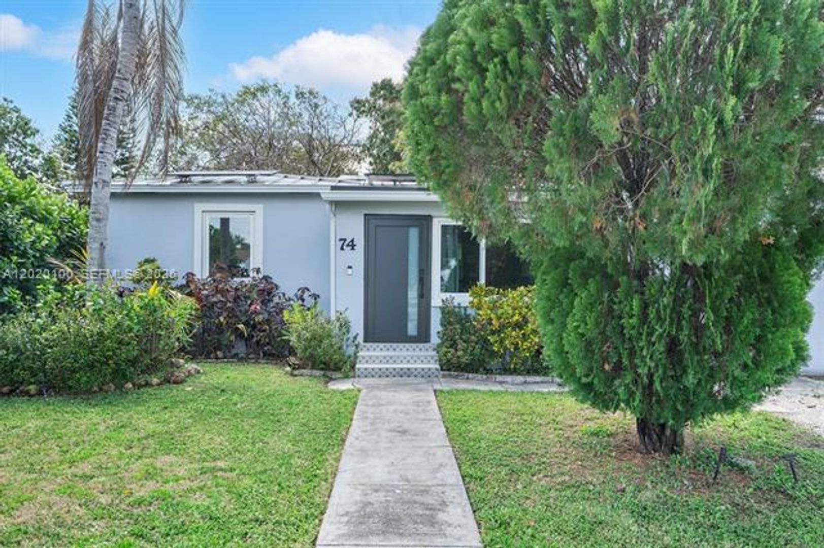 Miami House: 74 NW 117th St