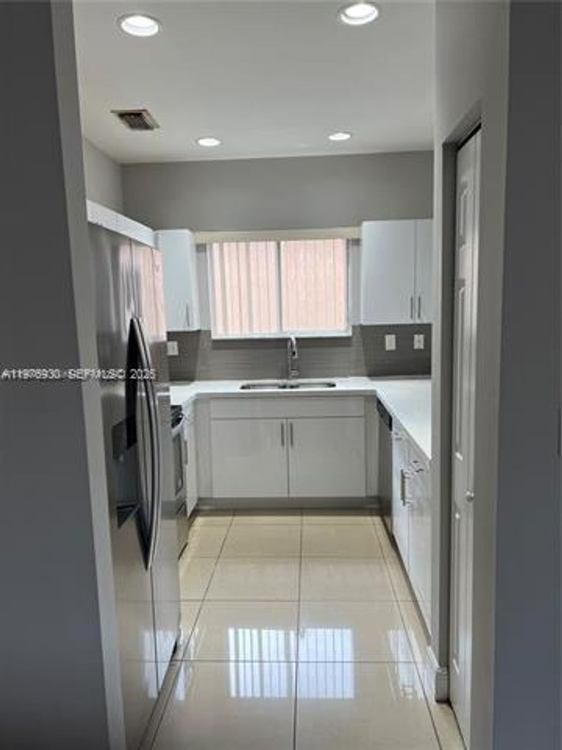 HOMESTEAD House: 3389 NE 4th St