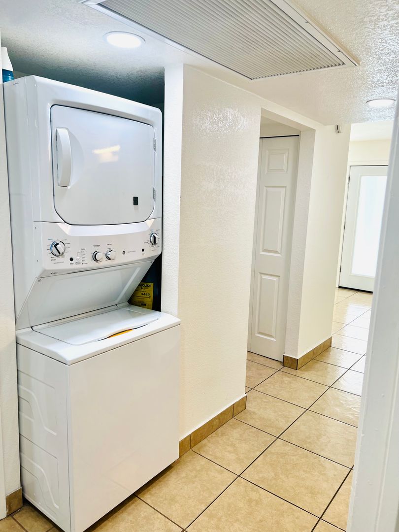 In-home laundry area — representative home at Arcadia Flats.