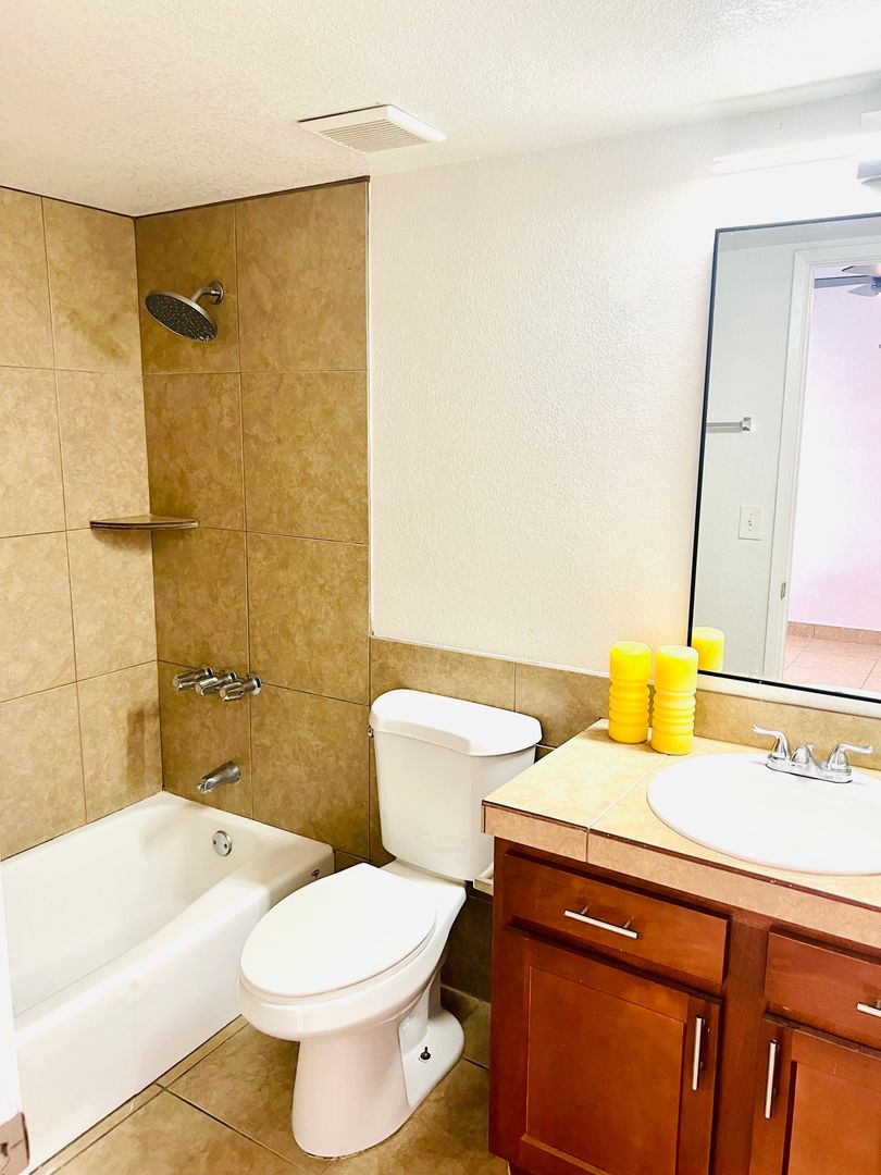 Apartment bathroom — representative home at Arcadia Flats.