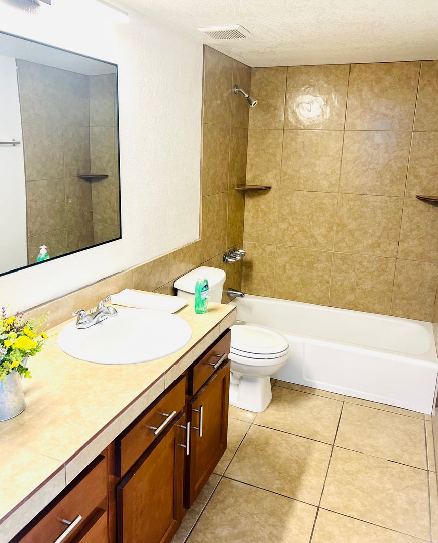 Apartment bathroom — representative home at Arcadia Flats.