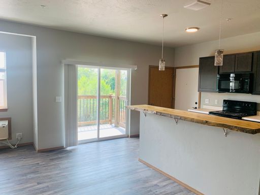 2 Bed - 1 Bath - North Russell Apartments – photo 1